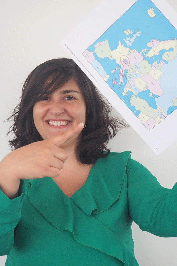 Woman showing the map of the European continent